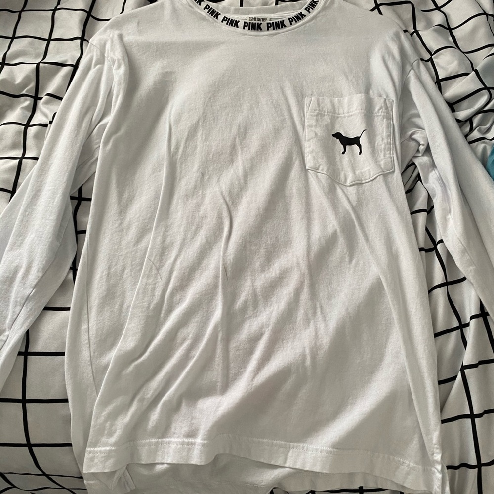 white t shirt with red writing on the back